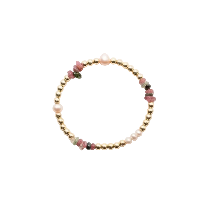 Beaded bracelet with gold and multicolored beads on a white background