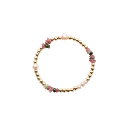 Beaded bracelet with gold and multicolored beads on a white background